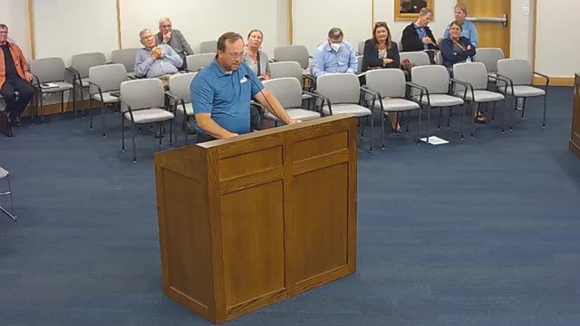 Residents rally against parking lot plan fearing traffic chaos