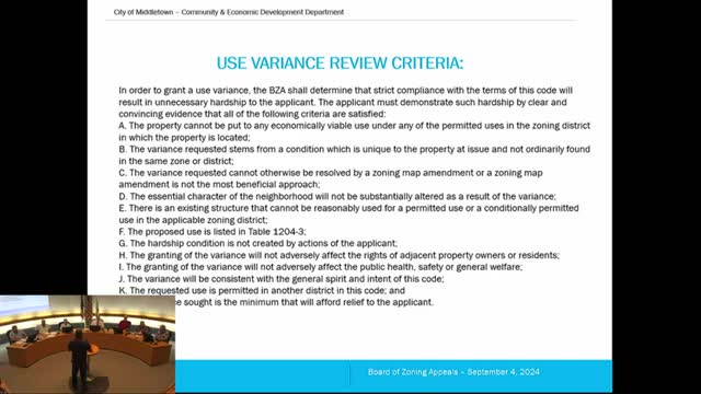 Homeowner battles city over fence and business rights