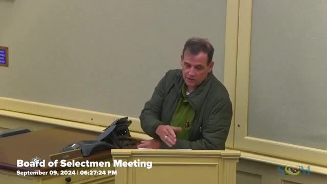 Residents rally against proposed sale of town open space
