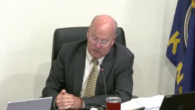 Commissioners debate future of controversial business zoning request