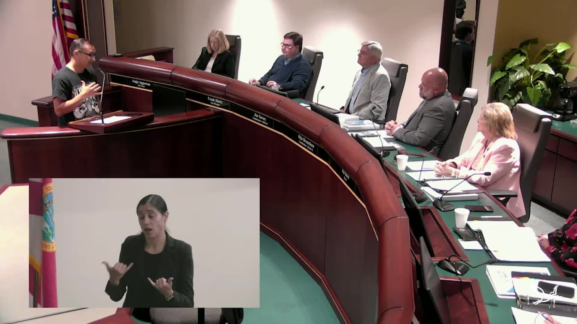 City meeting access sparks heated public debate