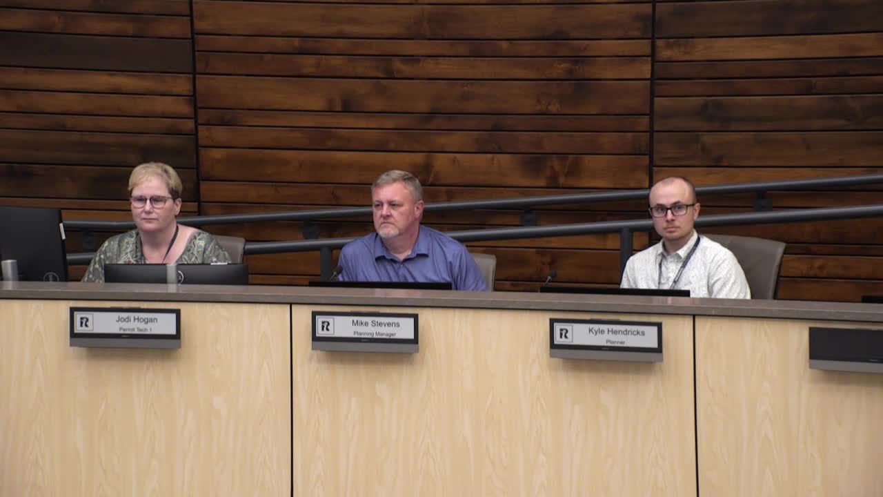 City hearing examines controversial cell tower and apartment project