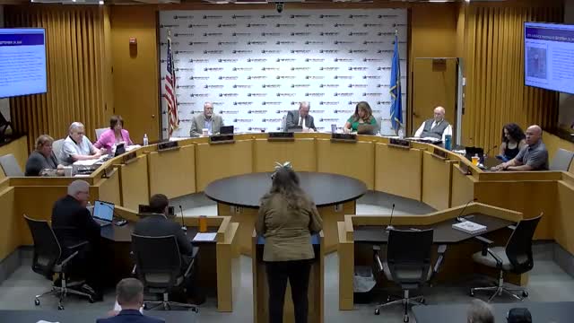 Residents rally against controversial apartment complex proposal