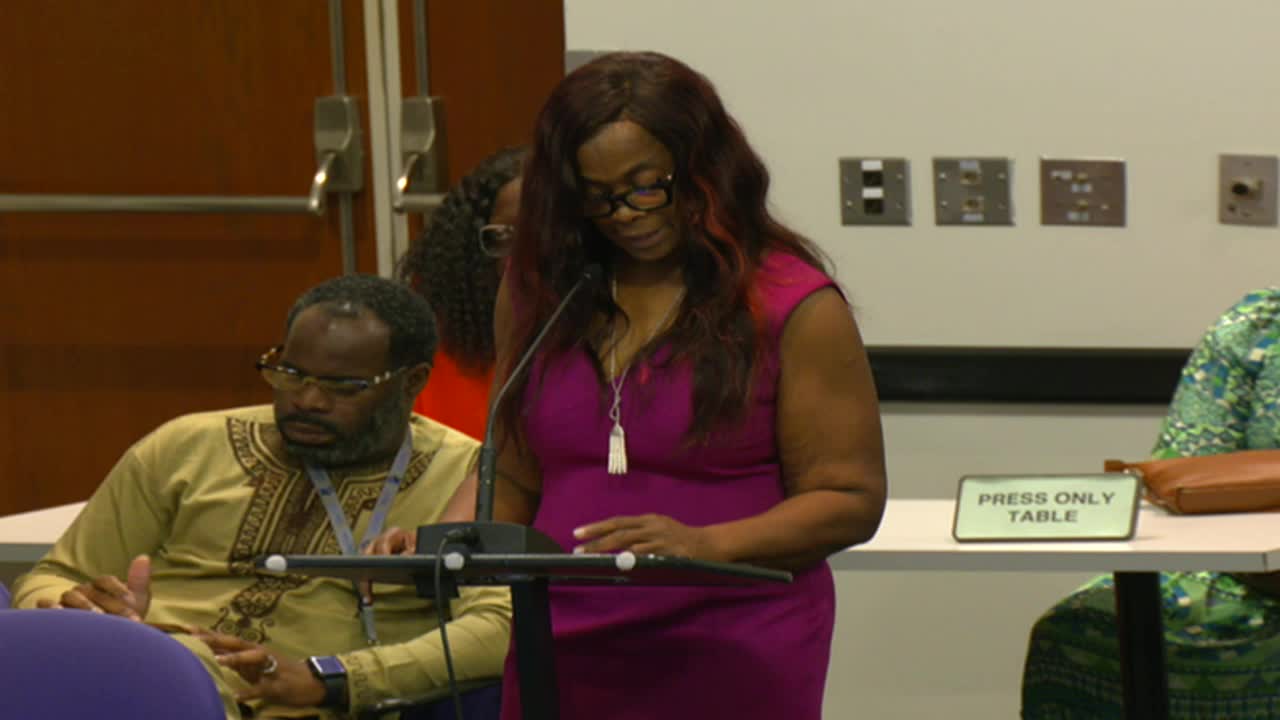 Community rallies to defend principal against suspension