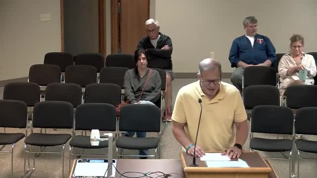Residents rally against controversial racetrack development