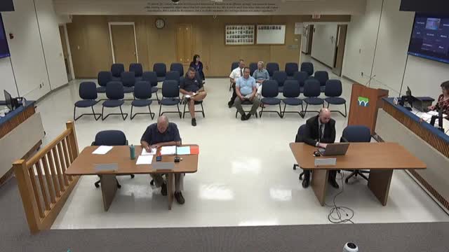 Hiring of new building inspector sparks vacation debate