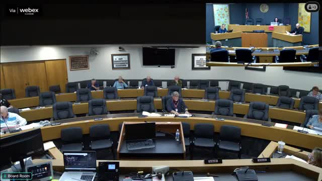 County officials clash over budget cuts and tax fairness