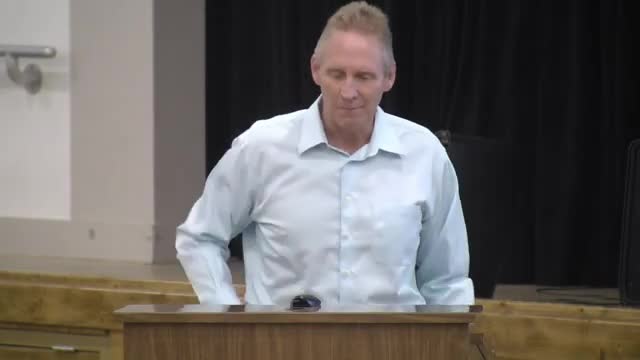 City leaders clash over controversial marina project debate