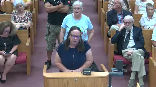 Residents rally against controversial golf course development plans