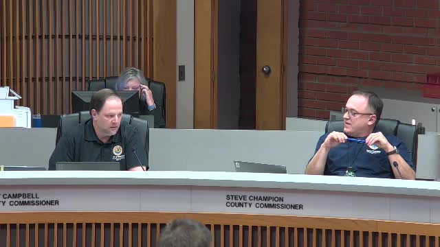 Budget Cuts Spark Heated Debate Over County Projects