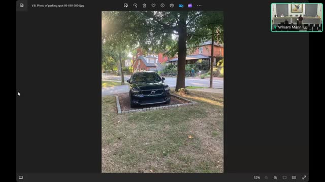 Business owner fights for parking permits amid controversy
