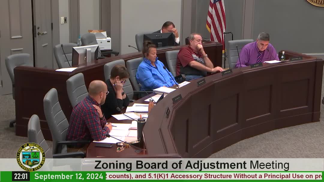 Zoning Board Deliberates Controversial Rehearings Amidst Tension
