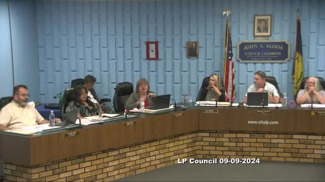City officials face furious residents over flooding crisis