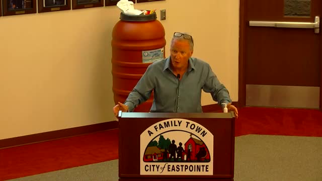 Business owner fights for public parking amid zoning challenges