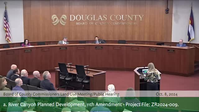 Residents rally against controversial housing development plan