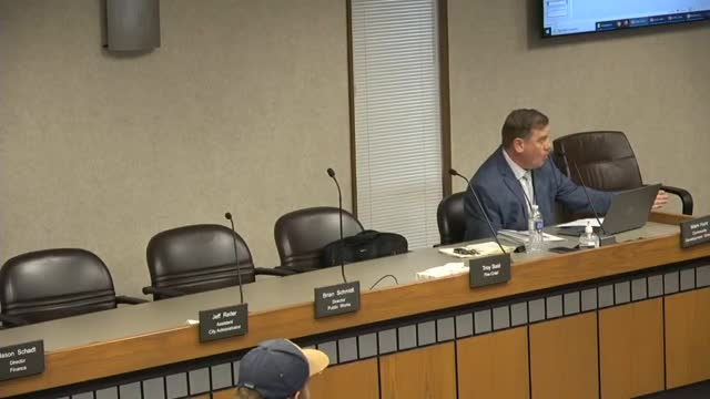 Fence Height Dispute Sparks Controversy at Local Board Meeting