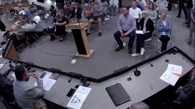 Town manager hired amid mayor's controversial removal debate
