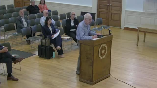 Residents rally against demolition of historic buildings