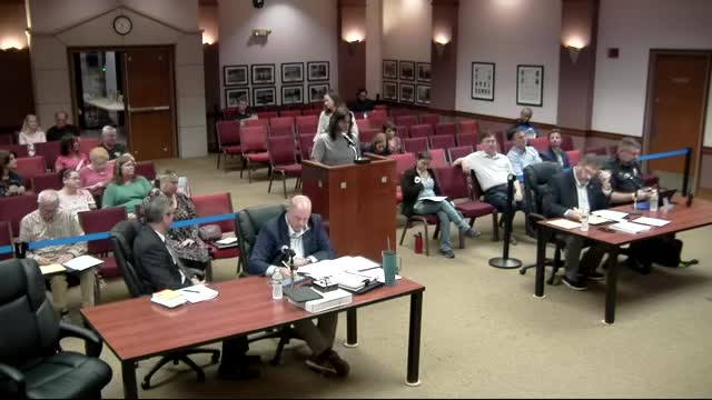 Residents rally against proposed water wall development plan