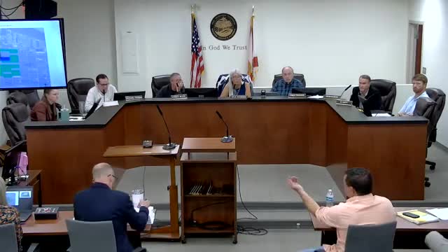 Residents rally against controversial wetland development plan