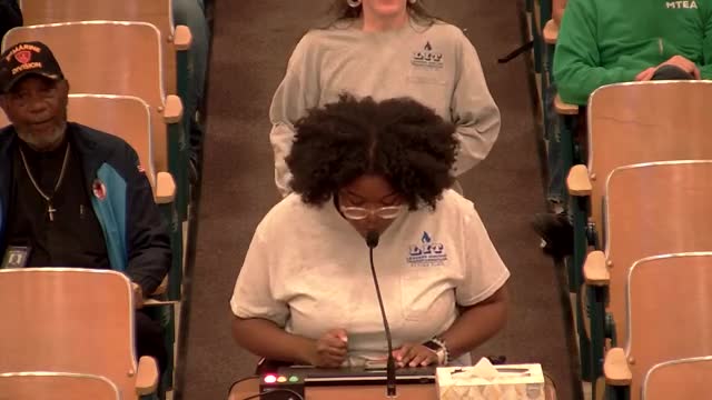 Activists demand school board reject armed officers in schools