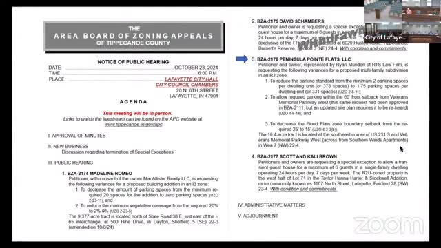 City approves controversial parking and floodplain variances