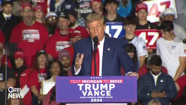Trump vows to revive auto industry and cut taxes
