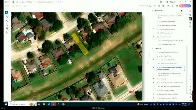City Council Approves Controversial Fence for Drainage Easement