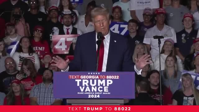Trump claims unity while attacking opponents in fiery rally
