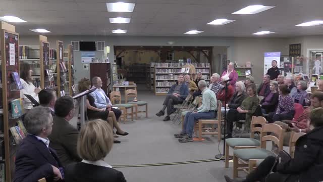Candidate confronts opponent's absence in heated debate
