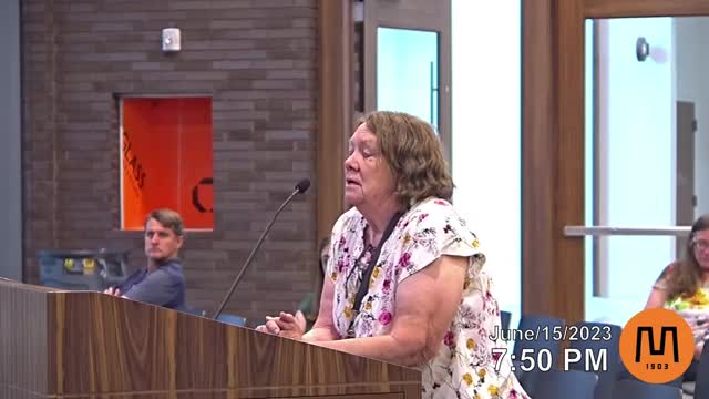 Residents rally against proposed street development in neighborhood