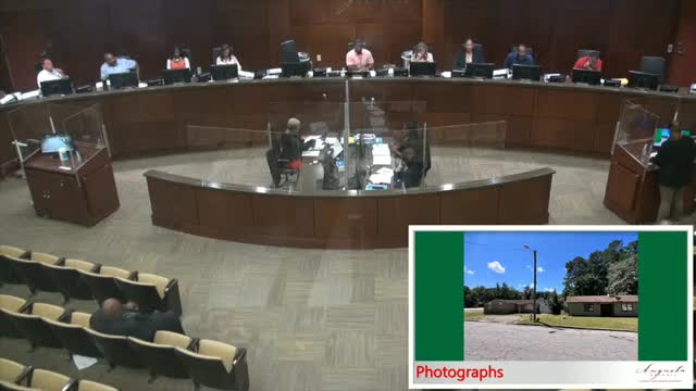 Community divided over proposed church parking lot plan