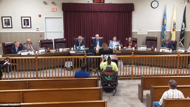 Activist confronts mayor over disabled rights access loss