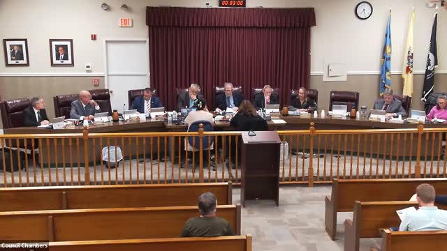 Council debates costly road improvements amid legal disputes
