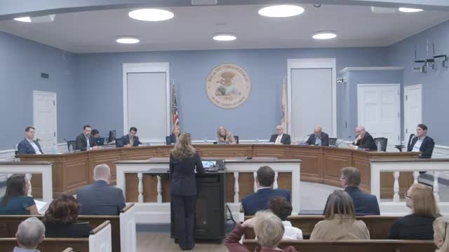 Town debates costly office project amid parking concerns