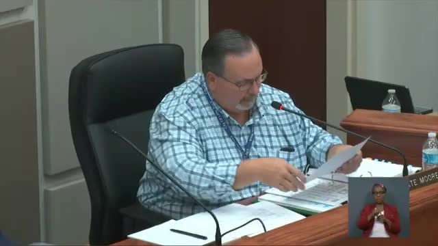 Neighbors rally against proposed dual home development
