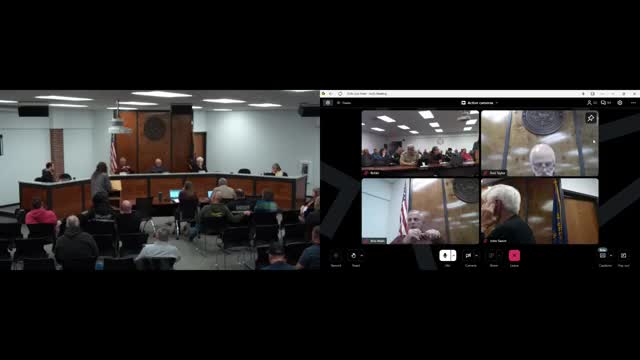 Commissioners clash over budget cuts and censure motion