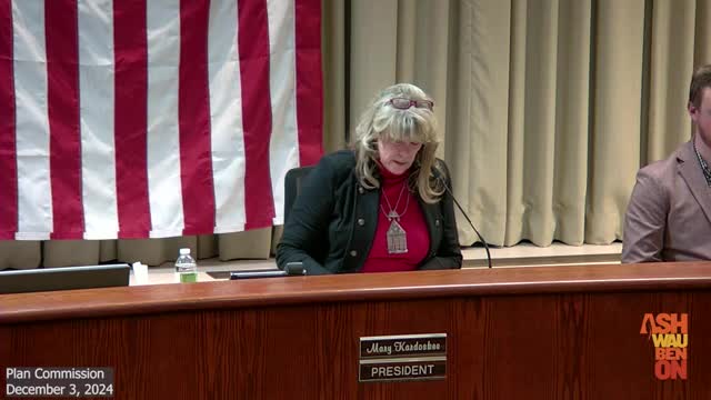 Village board approves controversial third wall sign