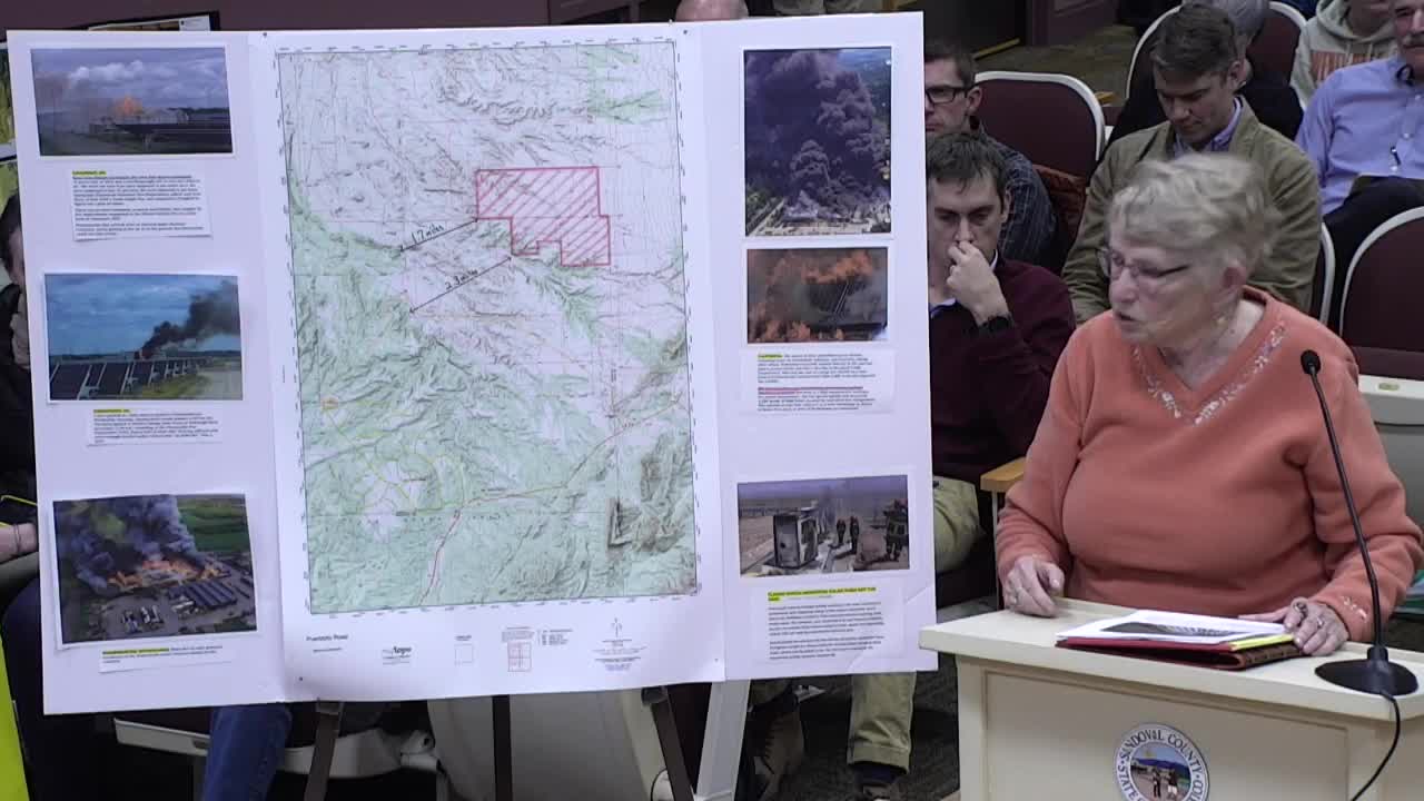 Opponents rally against controversial solar farm project