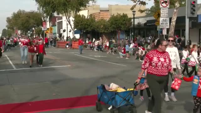 El Segundo celebrates holiday spirit with vibrant parade featuring Girl Scouts and Eagle marching band