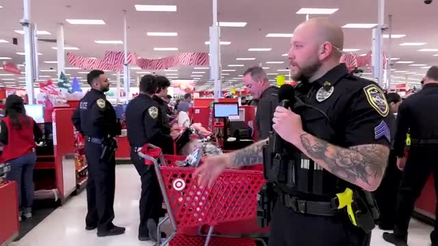 Local police team up with community for festive Shop with a Cop event