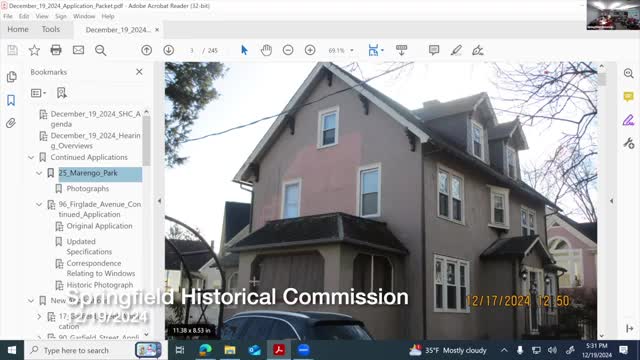 Commissioners debate historic roof replacement amid solar panel installation concerns