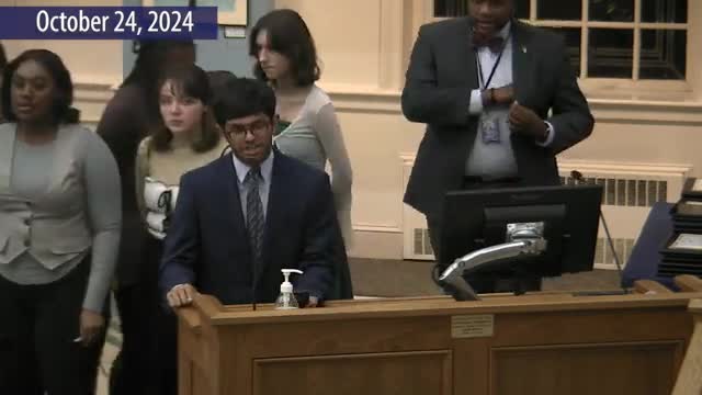 Women honor suffragists with performance of Keep Marching at school board meeting