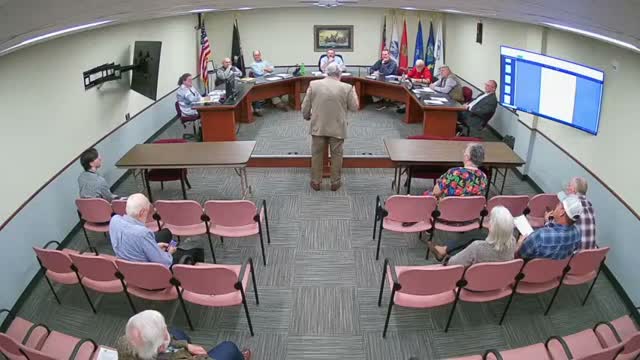 Residents urge county to push back on state building-code enforcement for tiny homes; commissioners and staff cite state code limits