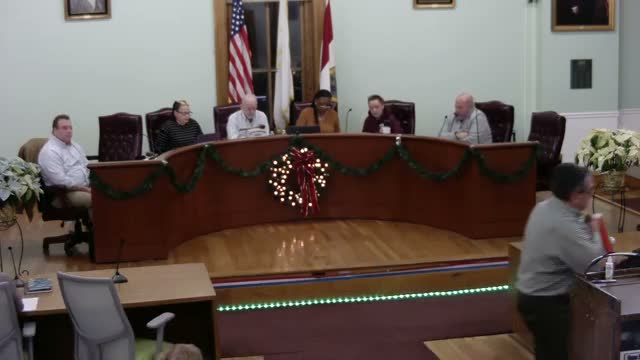 Woonsocket council approves homelessness committee and short-term Dignity Bus lease; CCA details staffing and funding shortfall