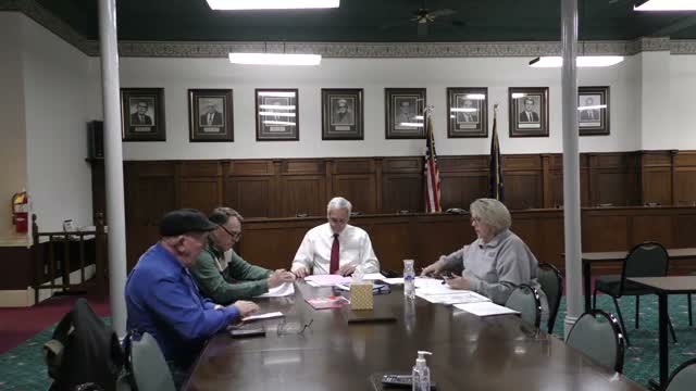 Resident urges permanent fix for recurring sewer backups tied to tree roots; board to maintain manhole