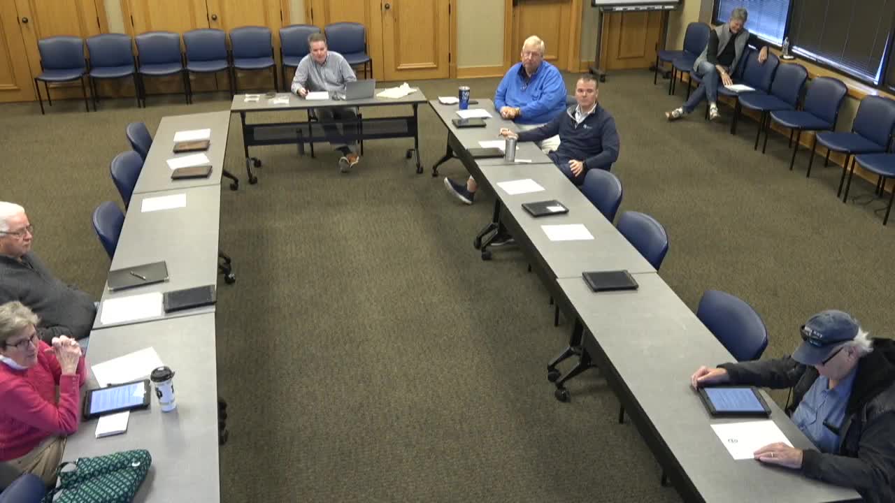 Staff recommends approval for screened deck at Raintree Forest lot under hillside protection rules