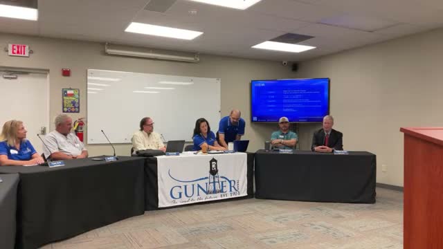 Officials say settlement talks are underway; town hall on 'Gunter' to follow when disclosure allowed