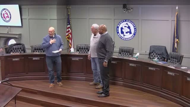 Court administers oath to two new Scott County Ag Extension board members