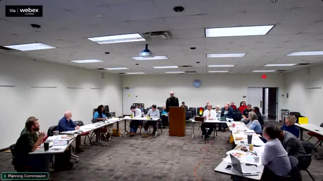 Developer presents Gaines School Road mixed‑use townhome concept; commissioners and neighbors raise stormwater and displacement concerns